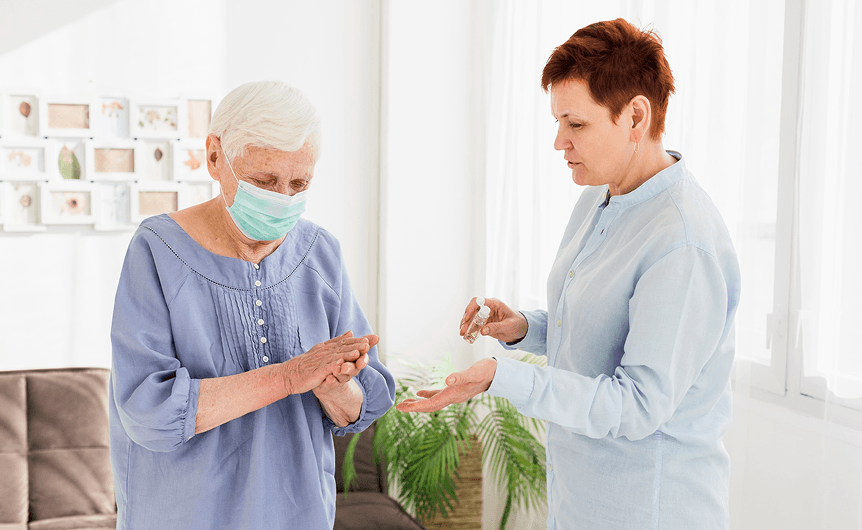 Caregiver and client in a warm, supportive home setting